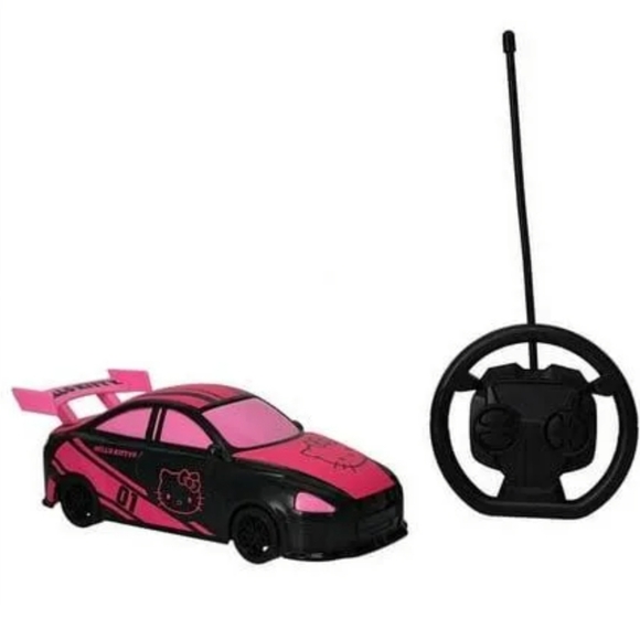 🙍🏼‍♂️⬇️Hello Kitty Remote Control Racing Car With Wheel Controller - Picture 1 of 11